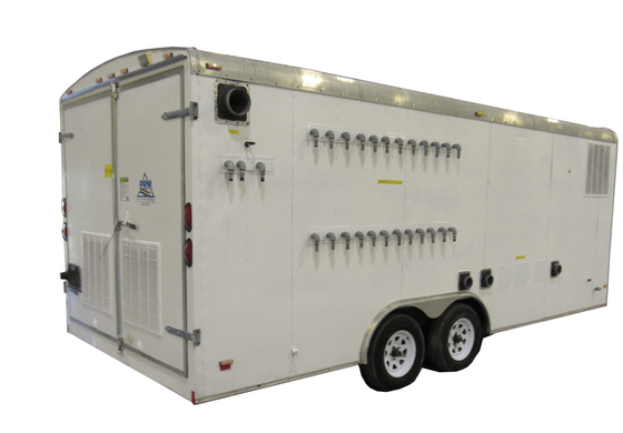 PRM enclosed rental trailer with exterior manifold connections on a dual-axle chassis